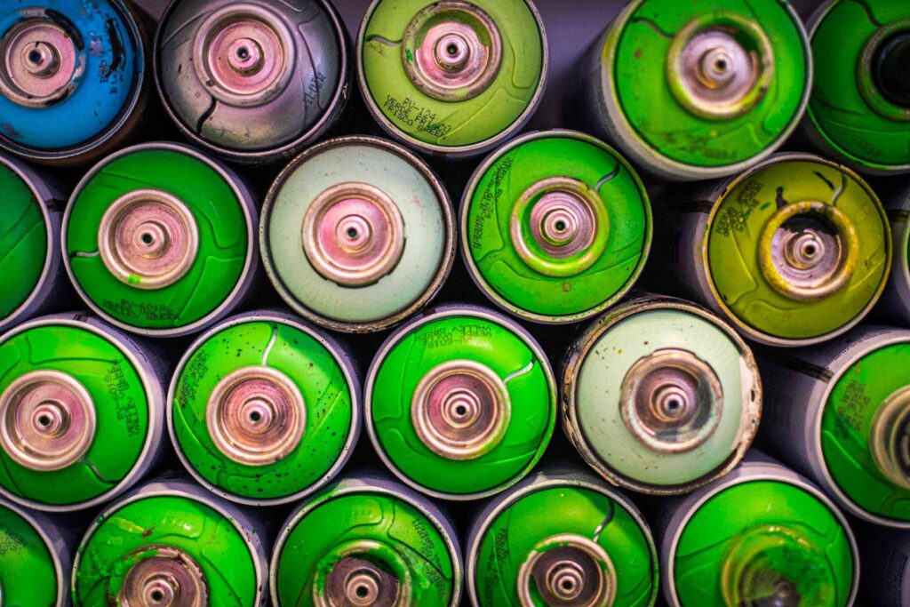 closeup shot of stacked spray cans paint 2023 11 27 05 34 19 utc.jpg